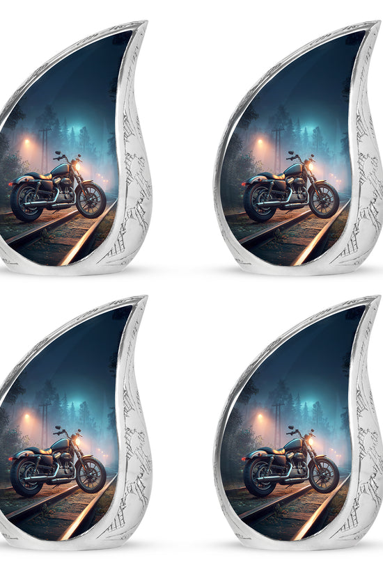 Steel Blue Bike Cremation Urn close-up of engraving and surface detail - smooth teardrop contour featuring bike art - 10 inch aluminum urn for cremated remains