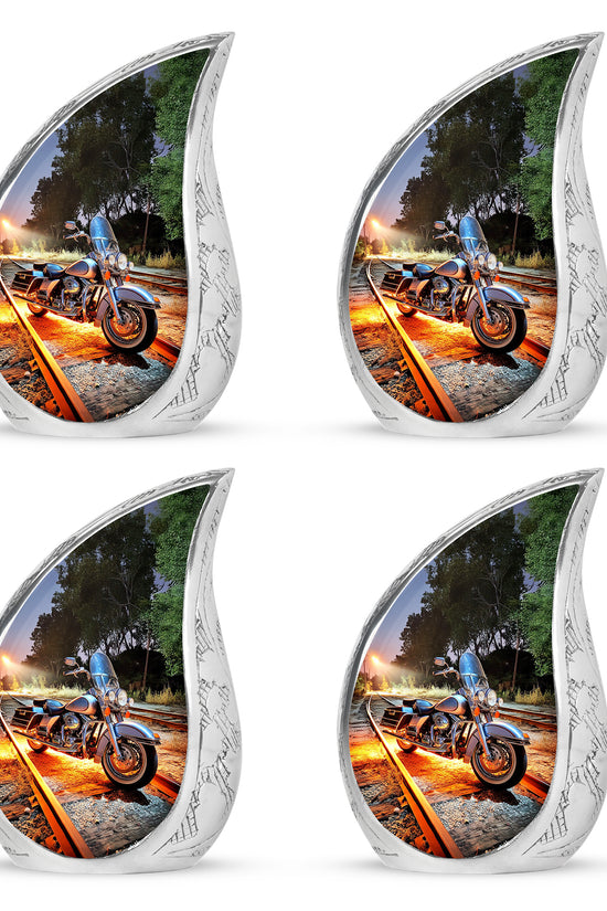 Bright Blue Bike Cremation Urn close-up of engraving and surface detail - graceful tear-shaped urn with bike motif - 10 inch aluminum urn for cremated remains