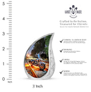 Navy Blue Bike Cremation Urn angled view of lid and engraved motif - flowing teardrop bike silhouette on curved aluminum - mini keepsake memorial for portion of cremation ashes