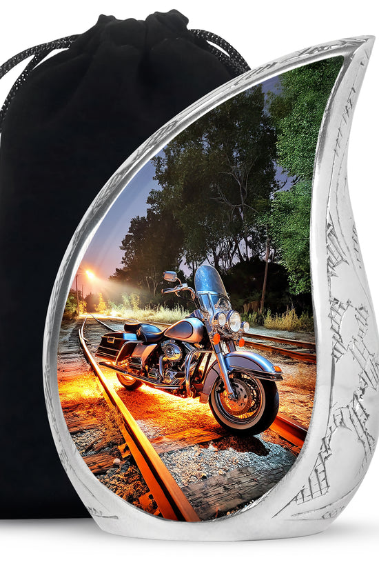 Royal Blue Bike Cremation Urn front view showing detailed design - graceful tear-shaped urn with bike motif - full-size 10 inch 200 cubic inch adult cremation urn