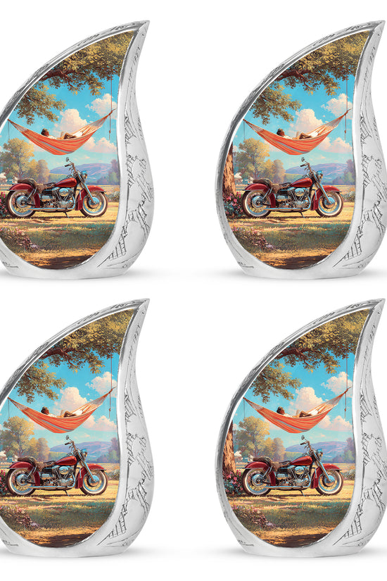 Tropical Teal Bike Cremation Urn close-up of engraving and surface detail - graceful tear-shaped urn with bike motif - 10 inch aluminum urn for cremated remains