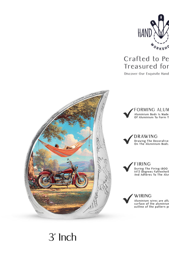 Ocean Teal Bike Cremation Urn angled view of lid and engraved motif - rounded teardrop bike design with delicate detail - mini keepsake memorial for portion of cremation ashes