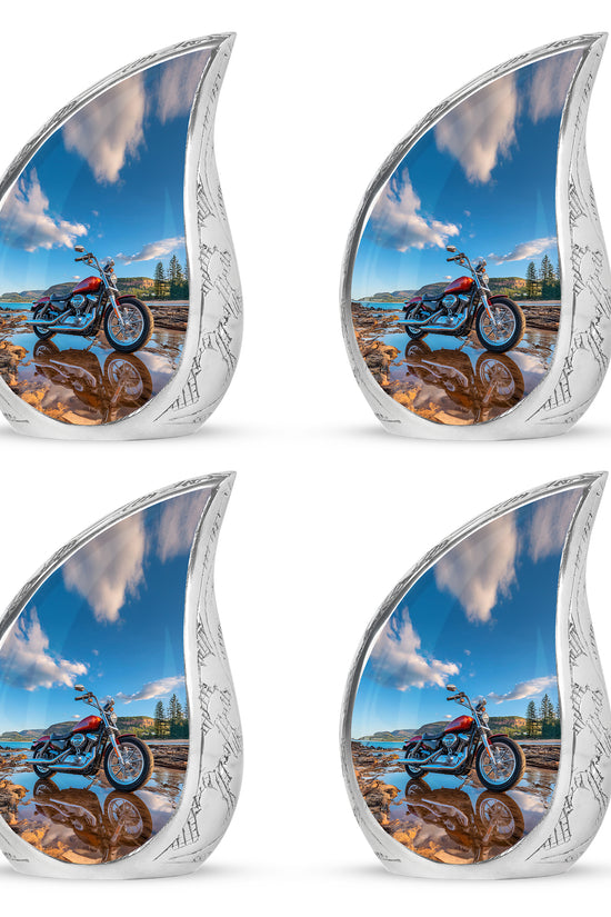 Bright Blue Bike Cremation Urn close-up of engraving and surface detail - graceful tear-shaped urn with bike motif - 10 inch aluminum urn for cremated remains