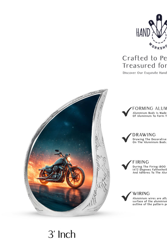 Indigo Bike Cremation Urn angled view of lid and engraved motif - rounded teardrop bike design with delicate detail - mini keepsake memorial for portion of cremation ashes