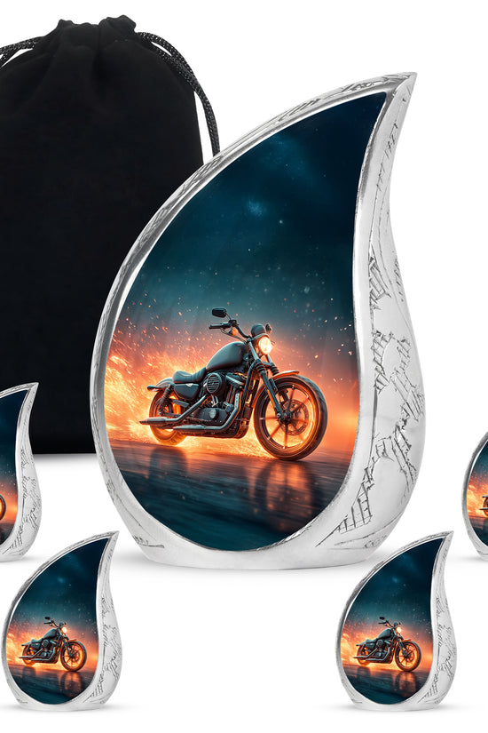 Azure Bike Cremation Urn side profile showing urn shape - flowing teardrop bike silhouette on curved aluminum - memorial set with one large and four small urns