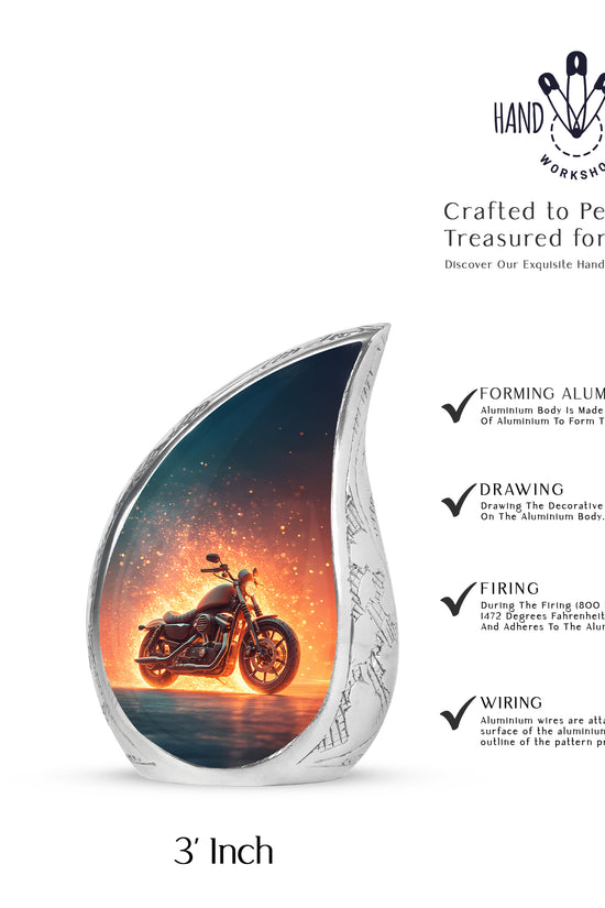 Powder Blue Bike Cremation Urn angled view of lid and engraved motif - rounded teardrop bike design with delicate detail - mini keepsake memorial for portion of cremation ashes