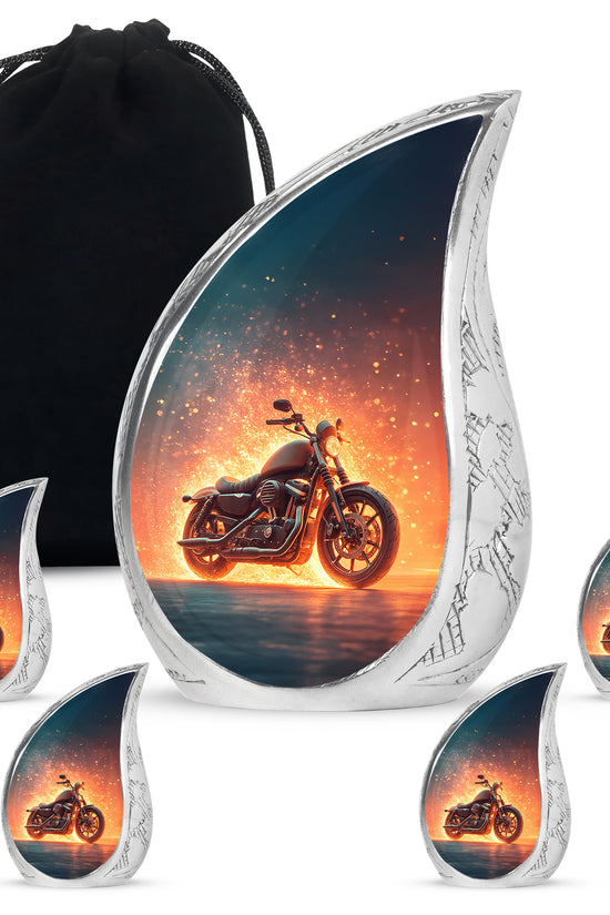Twilight Blue Bike Cremation Urn side profile showing urn shape - graceful tear-shaped urn with bike motif - memorial set with one large and four small urns