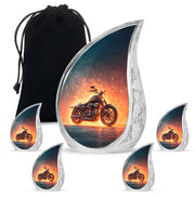 Twilight Blue Bike Cremation Urn side profile showing urn shape - graceful tear-shaped urn with bike motif - memorial set with one large and four small urns