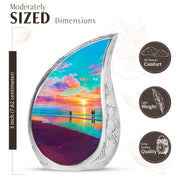 Deep Teal Beach Cremation Urn angled view of lid and engraved motif - graceful tear-shaped urn with beach motif - mini keepsake memorial for portion of cremation ashes