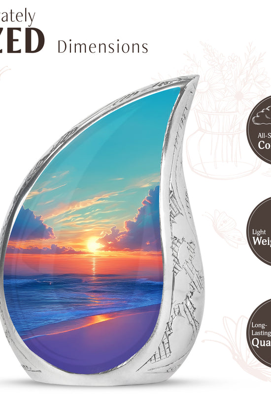 Mystic Teal Beach Cremation Urn angled view of lid and engraved motif - smooth teardrop contour featuring beach art - mini keepsake memorial for portion of cremation ashes