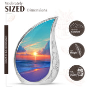 Mystic Teal Beach Cremation Urn angled view of lid and engraved motif - smooth teardrop contour featuring beach art - mini keepsake memorial for portion of cremation ashes