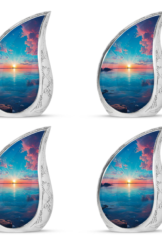 Sea Green Teal Beach Cremation Urn close-up of engraving and surface detail - flowing teardrop beach silhouette on curved aluminum - 10 inch aluminum urn for cremated remains