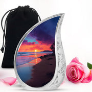 Sapphire Blue Beach Cremation Urn front view showing detailed design - smooth teardrop contour featuring beach art - full-size 10 inch 200 cubic inch adult cremation urn