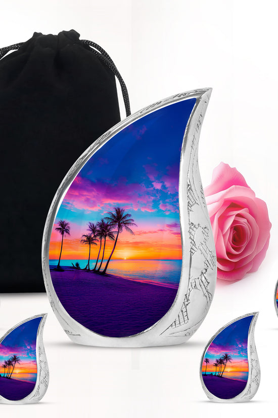Icy Blue Beach Cremation Urn side profile showing urn shape - rounded teardrop beach design with delicate detail - memorial set with one large and four small urns