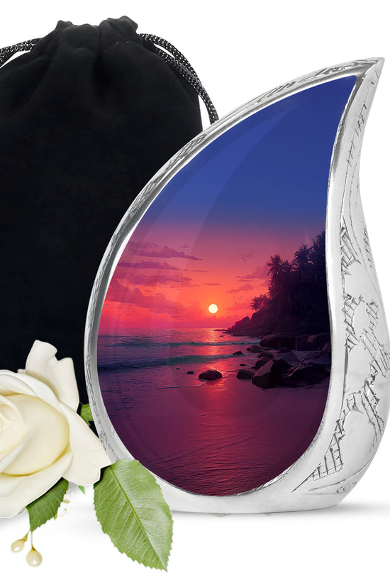 Peony Pink Beach Cremation Urn front view showing detailed design - flowing teardrop beach silhouette on curved aluminum - full-size 10 inch 200 cubic inch adult cremation urn
