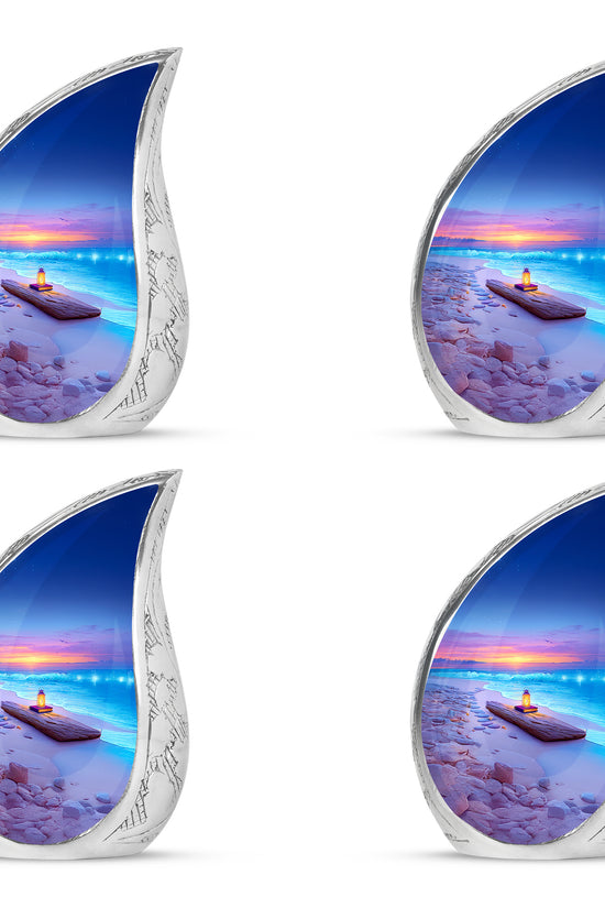 Steel Blue Beach Cremation Urn close-up of engraving and surface detail - smooth teardrop contour featuring beach art - 10 inch aluminum urn for cremated remains