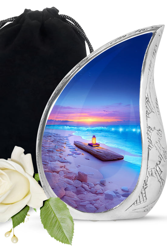 Sapphire Blue Beach Cremation Urn front view showing detailed design - graceful tear-shaped urn with beach motif - full-size 10 inch 200 cubic inch adult cremation urn