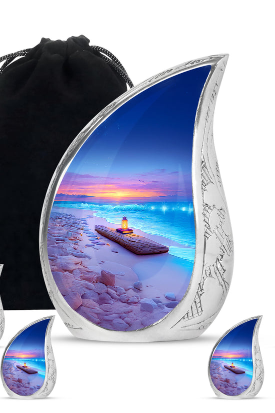 Soft Blue Beach Cremation Urn side profile showing urn shape - graceful tear-shaped urn with beach motif - memorial set with one large and four small urns
