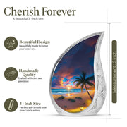 Twilight Blue Beach Cremation Urn angled view of lid and engraved motif - smooth teardrop contour featuring beach art - mini keepsake memorial for portion of cremation ashes