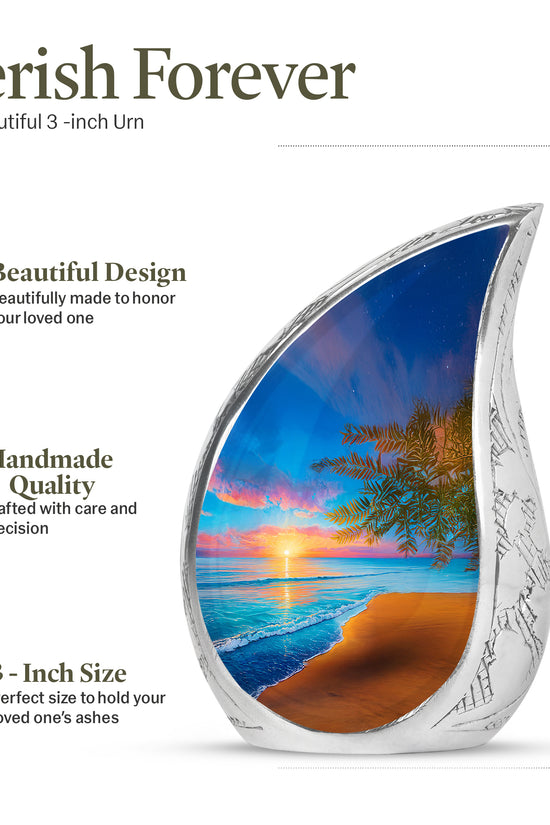 Soft Blue Beach Cremation Urn angled view of lid and engraved motif - graceful tear-shaped urn with beach motif - mini keepsake memorial for portion of cremation ashes