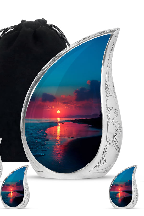 Sapphire Blue Beach Cremation Urn side profile showing urn shape - graceful tear-shaped urn with beach motif - memorial set with one large and four small urns