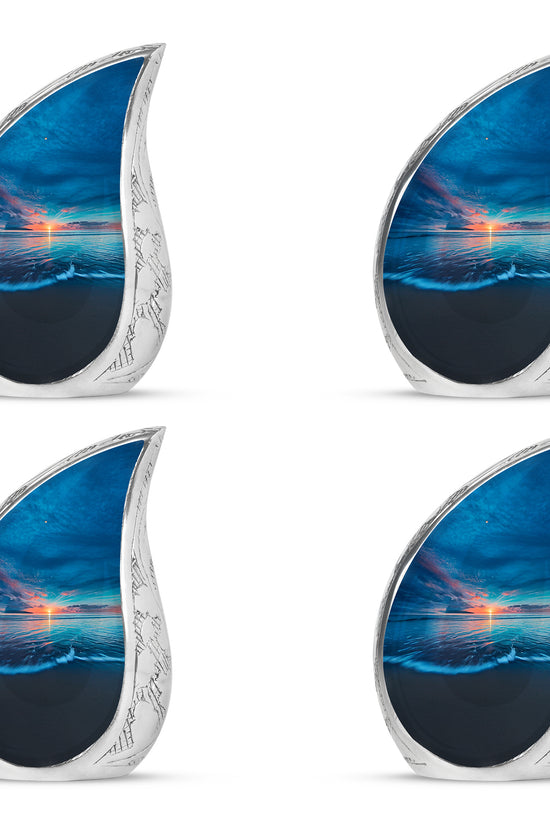 Indigo Beach Cremation Urn close-up of engraving and surface detail - rounded teardrop beach design with delicate detail - 10 inch aluminum urn for cremated remains