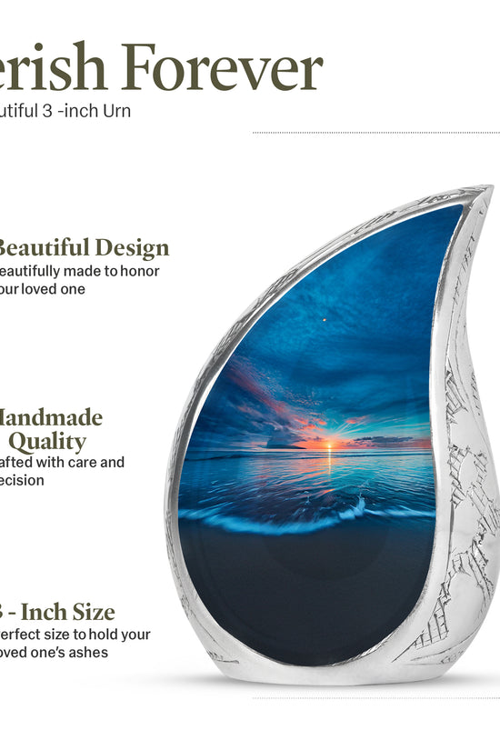 Sky Blue Beach Cremation Urn angled view of lid and engraved motif - rounded teardrop beach design with delicate detail - mini keepsake memorial for portion of cremation ashes