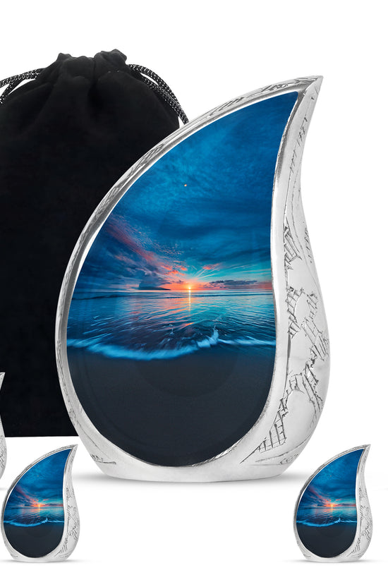 Navy Blue Beach Cremation Urn side profile showing urn shape - rounded teardrop beach design with delicate detail - memorial set with one large and four small urns