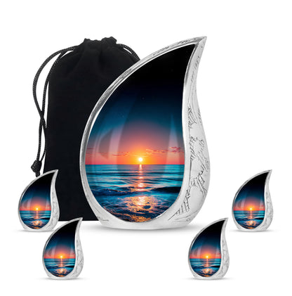 Cobalt Blue Beach Cremation Urn side profile showing urn shape - graceful tear-shaped urn with beach motif - memorial set with one large and four small urns