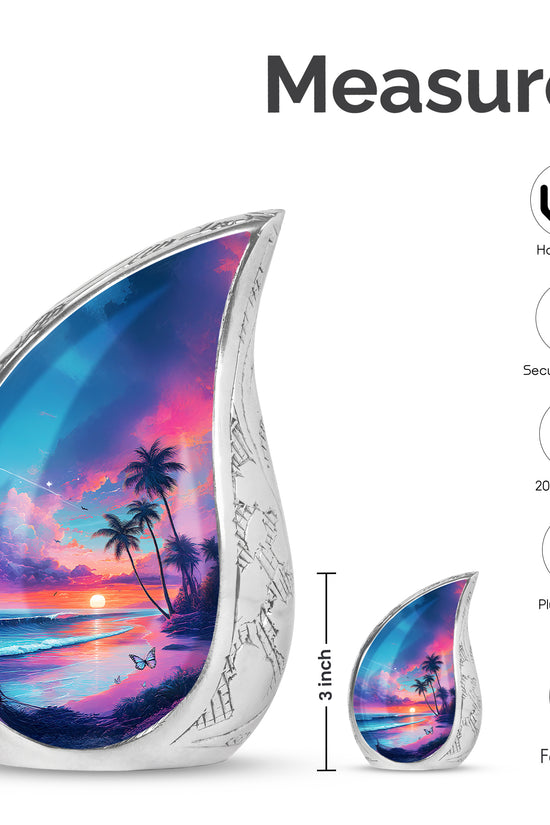 Twilight Blue Beach Cremation Urn angled view of lid and engraved motif - smooth teardrop contour featuring beach art - mini keepsake memorial for portion of cremation ashes