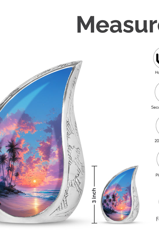 Twilight Blue Beach Cremation Urn angled view of lid and engraved motif - graceful tear-shaped urn with beach motif - mini keepsake memorial for portion of cremation ashes