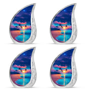 Azure Beach Cremation Urn close-up of engraving and surface detail - flowing teardrop beach silhouette on curved aluminum - 10 inch aluminum urn for cremated remains