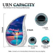 Cornflower Blue Beach Cremation Urn angled view of lid and engraved motif - smooth teardrop contour featuring beach art - mini keepsake memorial for portion of cremation ashes