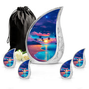 Pastel Blue Beach Cremation Urn side profile showing urn shape - rounded teardrop beach design with delicate detail - memorial set with one large and four small urns