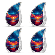 Indigo Beach Cremation Urn close-up of engraving and surface detail - flowing teardrop beach silhouette on curved aluminum - 10 inch aluminum urn for cremated remains