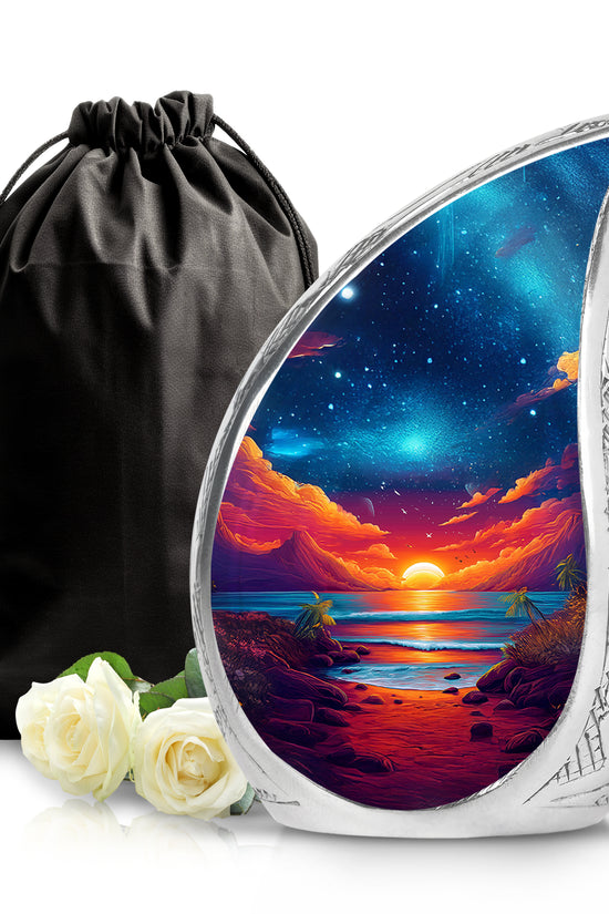 Misty Blue Beach Cremation Urn front view showing detailed design - flowing teardrop beach silhouette on curved aluminum - full-size 10 inch 200 cubic inch adult cremation urn