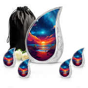 Dusty Blue Beach Cremation Urn side profile showing urn shape - flowing teardrop beach silhouette on curved aluminum - memorial set with one large and four small urns