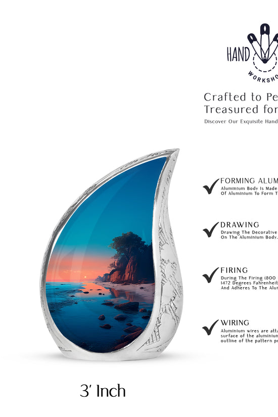 Sea Green Teal Beach Cremation Urn angled view of lid and engraved motif - rounded teardrop beach design with delicate detail - mini keepsake memorial for portion of cremation ashes