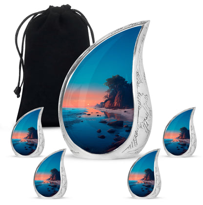 Jewel Teal Beach Cremation Urn side profile showing urn shape - flowing teardrop beach silhouette on curved aluminum - memorial set with one large and four small urns