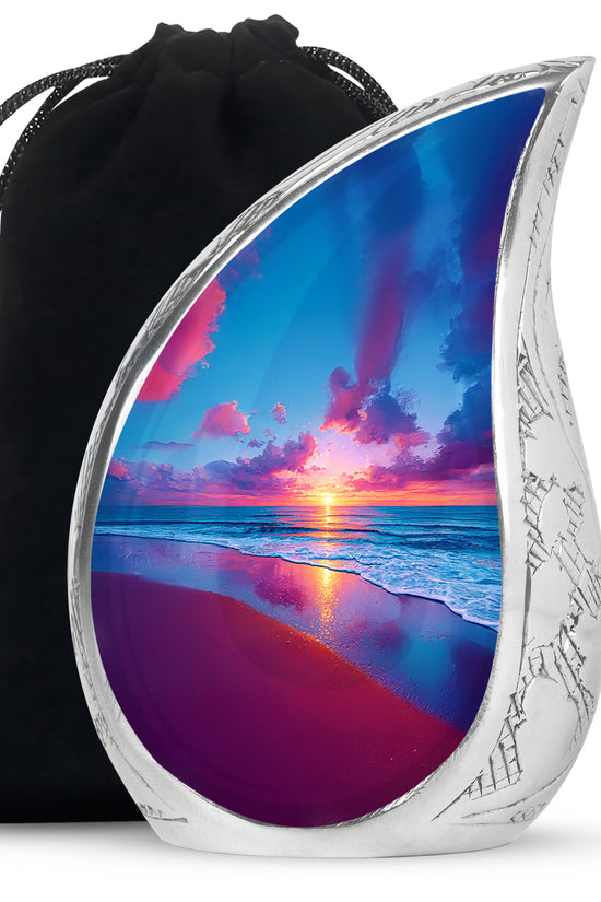 Navy Blue Beach Cremation Urn front view showing detailed design - flowing teardrop beach silhouette on curved aluminum - full-size 10 inch 200 cubic inch adult cremation urn