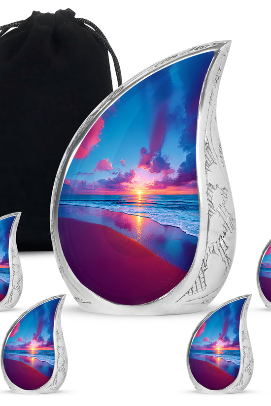 Misty Blue Beach Cremation Urn side profile showing urn shape - flowing teardrop beach silhouette on curved aluminum - memorial set with one large and four small urns