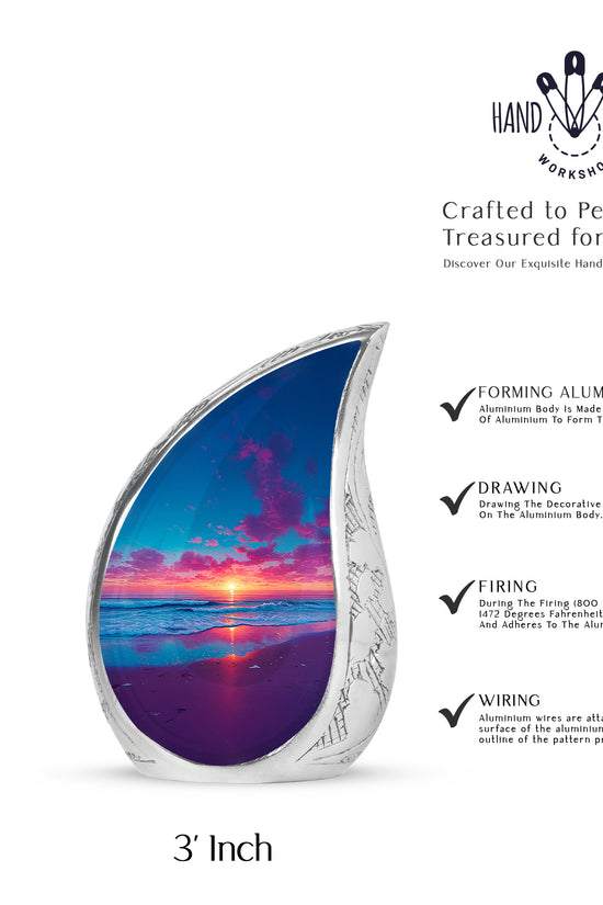 Misty Blue Beach Cremation Urn angled view of lid and engraved motif - rounded teardrop beach design with delicate detail - mini keepsake memorial for portion of cremation ashes