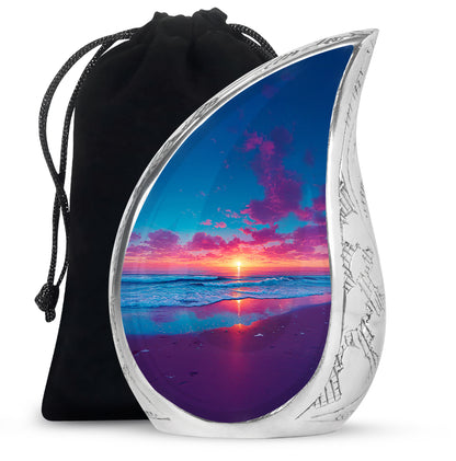 Misty Blue Beach Cremation Urn front view showing detailed design - flowing teardrop beach silhouette on curved aluminum - full-size 10 inch 200 cubic inch adult cremation urn