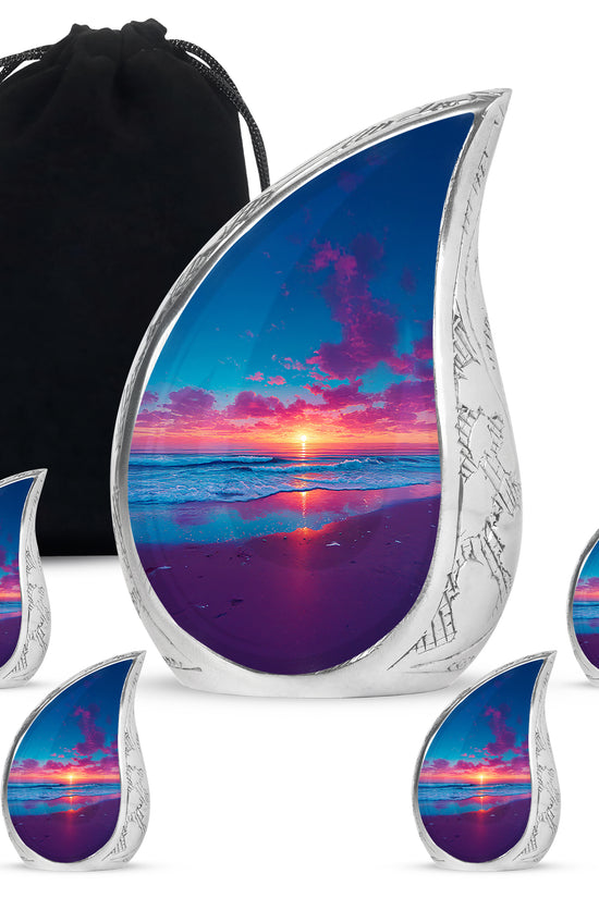Azure Beach Cremation Urn side profile showing urn shape - flowing teardrop beach silhouette on curved aluminum - memorial set with one large and four small urns