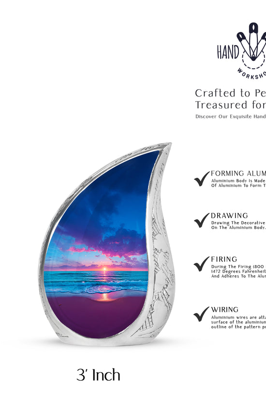 Calming Blue Beach Cremation Urn angled view of lid and engraved motif - graceful tear-shaped urn with beach motif - mini keepsake memorial for portion of cremation ashes