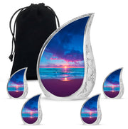 Sapphire Blue Beach Cremation Urn side profile showing urn shape - smooth teardrop contour featuring beach art - memorial set with one large and four small urns