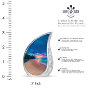 Pastel Blue Beach Cremation Urn angled view of lid and engraved motif - rounded teardrop beach design with delicate detail - mini keepsake memorial for portion of cremation ashes