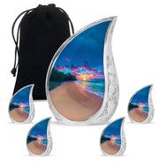 Twilight Blue Beach Cremation Urn side profile showing urn shape - graceful tear-shaped urn with beach motif - memorial set with one large and four small urns