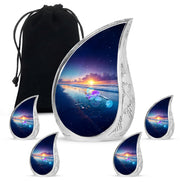 Cornflower Blue Beach Cremation Urn side profile showing urn shape - smooth teardrop contour featuring beach art - memorial set with one large and four small urns