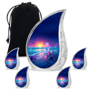 Cornflower Blue Beach Cremation Urn side profile showing urn shape - smooth teardrop contour featuring beach art - memorial set with one large and four small urns